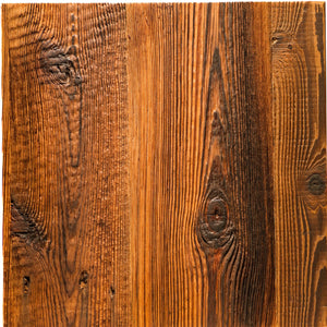 A square sample of rustic stained wood paneling with vertical grain and dark knots, shown against a plain white background.