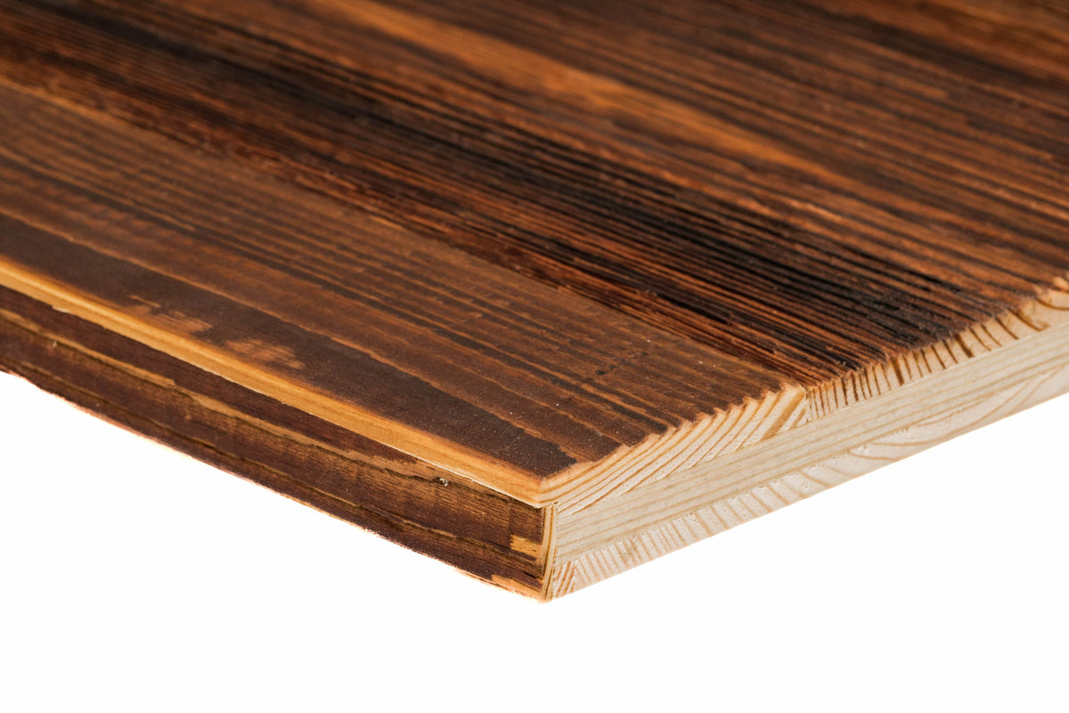 Close-up of a medium rustic brown reclaimed barn wood panel with layered grain texture and natural colour transitions.