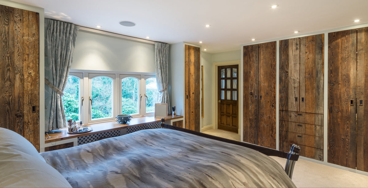 bespoke reclaimed barn wood wardrobe with a natural finish created by uk joinery